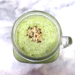 SpaJuiceBar Creamy Green smoothie is made with organic kale, organic spinach, banana, almond milk, organic hemp seed. Garnished with organic hemp seeds