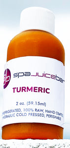 SpaJuiceBar cold pressed turmeric juice in a 2oz bottle. Turmeric is known to combat inflammation.